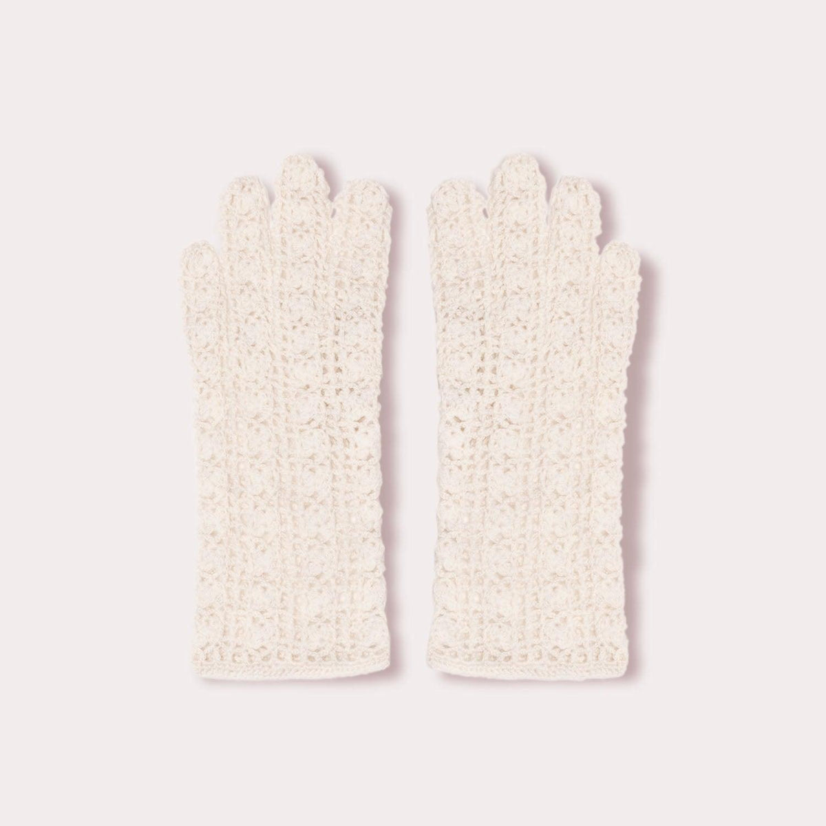 White wool gloves by Seymoure Gloves.